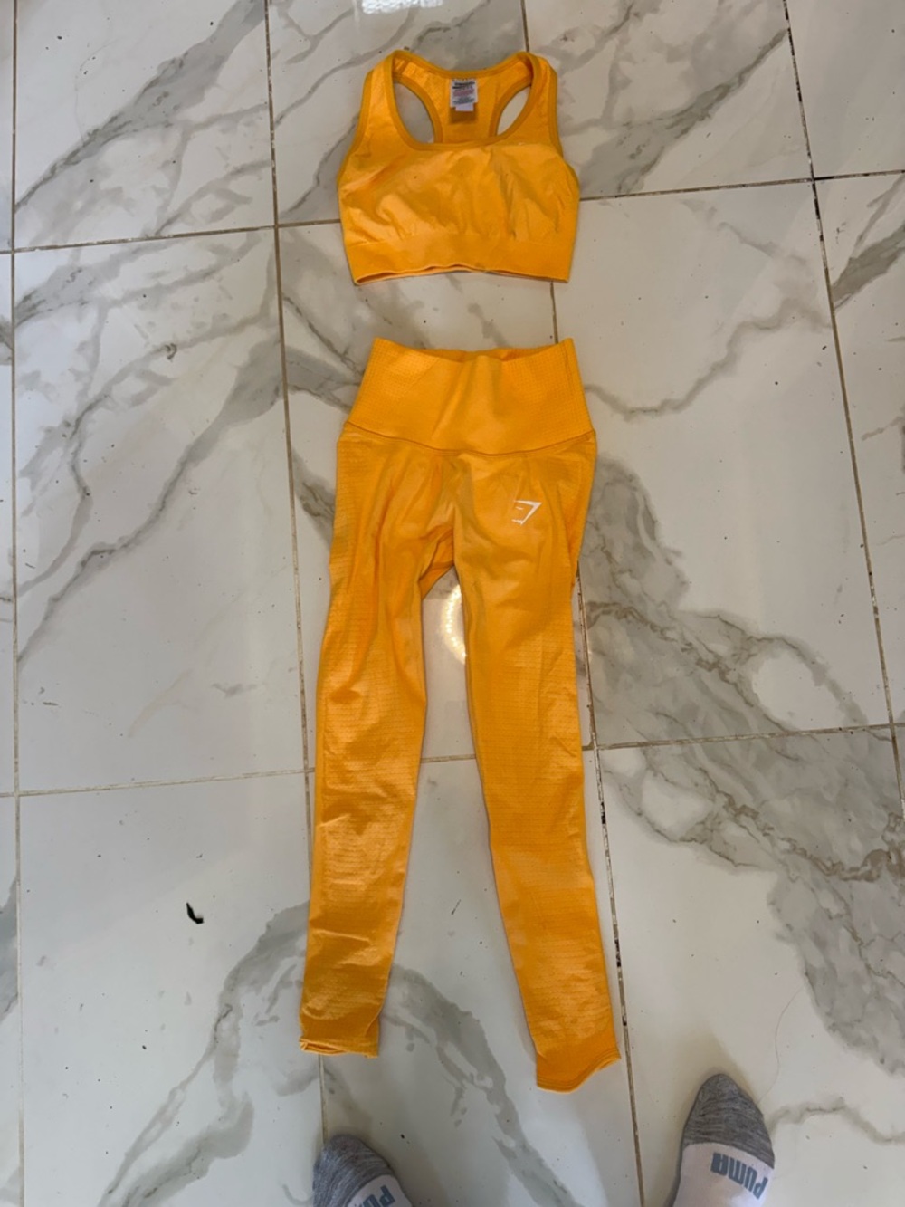 perfect condition! orange Racerback Sports Bra with matching leggings!